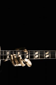 man-playing-guitar-close-up-barry-rosenthal